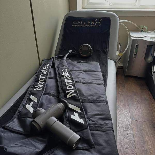 Dr Torrey Schroeder Chiropractic Centre in front of CELLER8 biohacker package